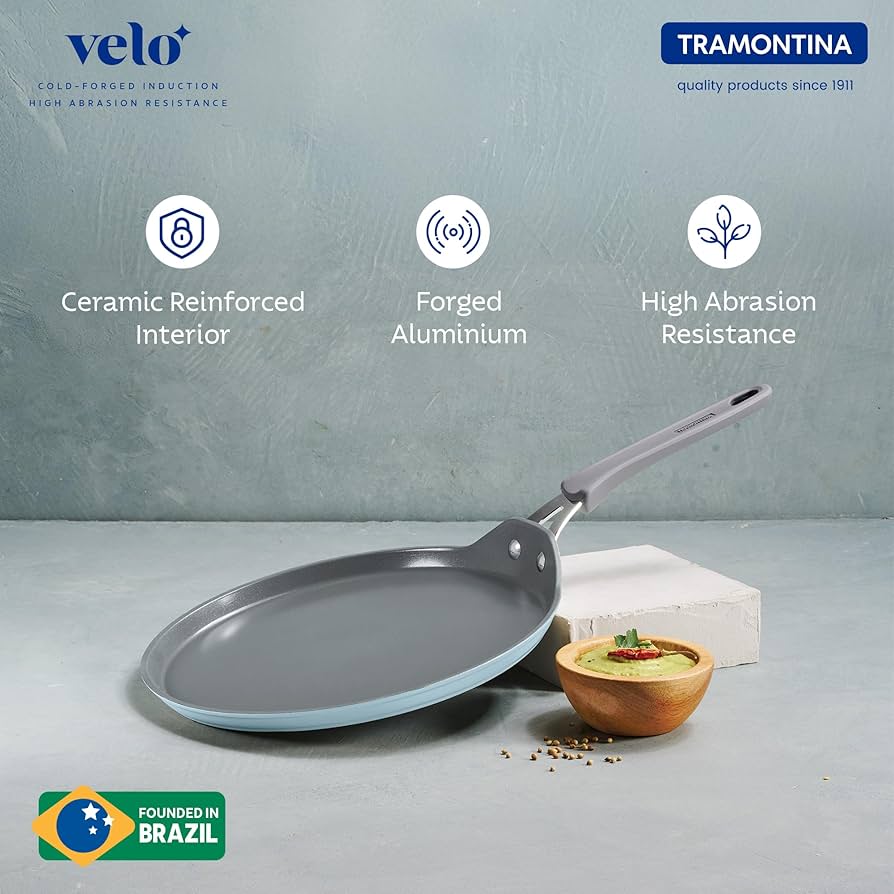 Tramontina Velo 28cm Forged with Ceramic Reinforced Interior Flat Dosa Tawa | Raised Edges | Gas/Induction Cookware | Tawa for Dosa,Uttapam | Stainless Steel Handle | Silicone Grip | Sea Blue